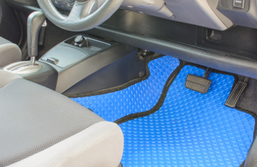 blue rubber car mats in car