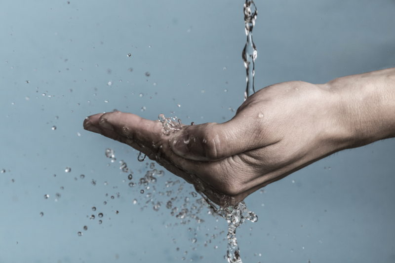 water dripping in hand, hand care, water, water conservation, sustainability, drops of water, environmental,