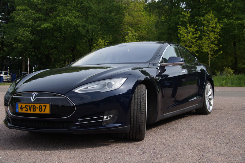 Tesla, sports car, black, driving, road, parked, battery-operated, wheels.