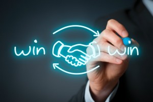 Handshake, writing, win, winning, partnership, teamwork, winning customers, success.