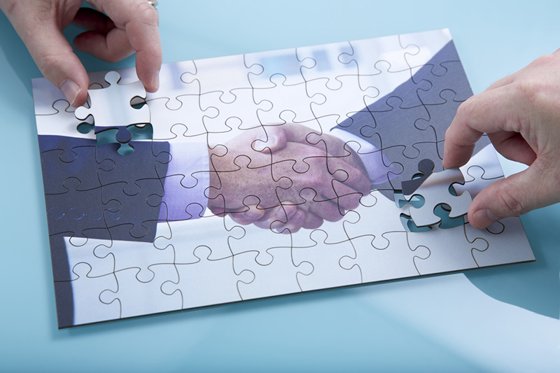 mergers, acquisitions, handshake, puzzle, puzzle pieces, business deal