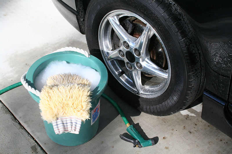 driveway washing, bucket, sponge, car, tire, suds