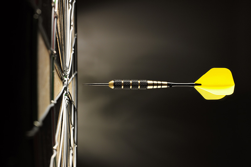 yellow dart, bullseye, dartboard
