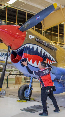 Team polishes vintage aircraft and exotic cars at war musee